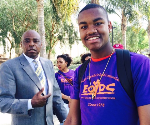 Candid Shot of LMU Assistant Director of Enrollment Charles Mason and Miles Lawrence